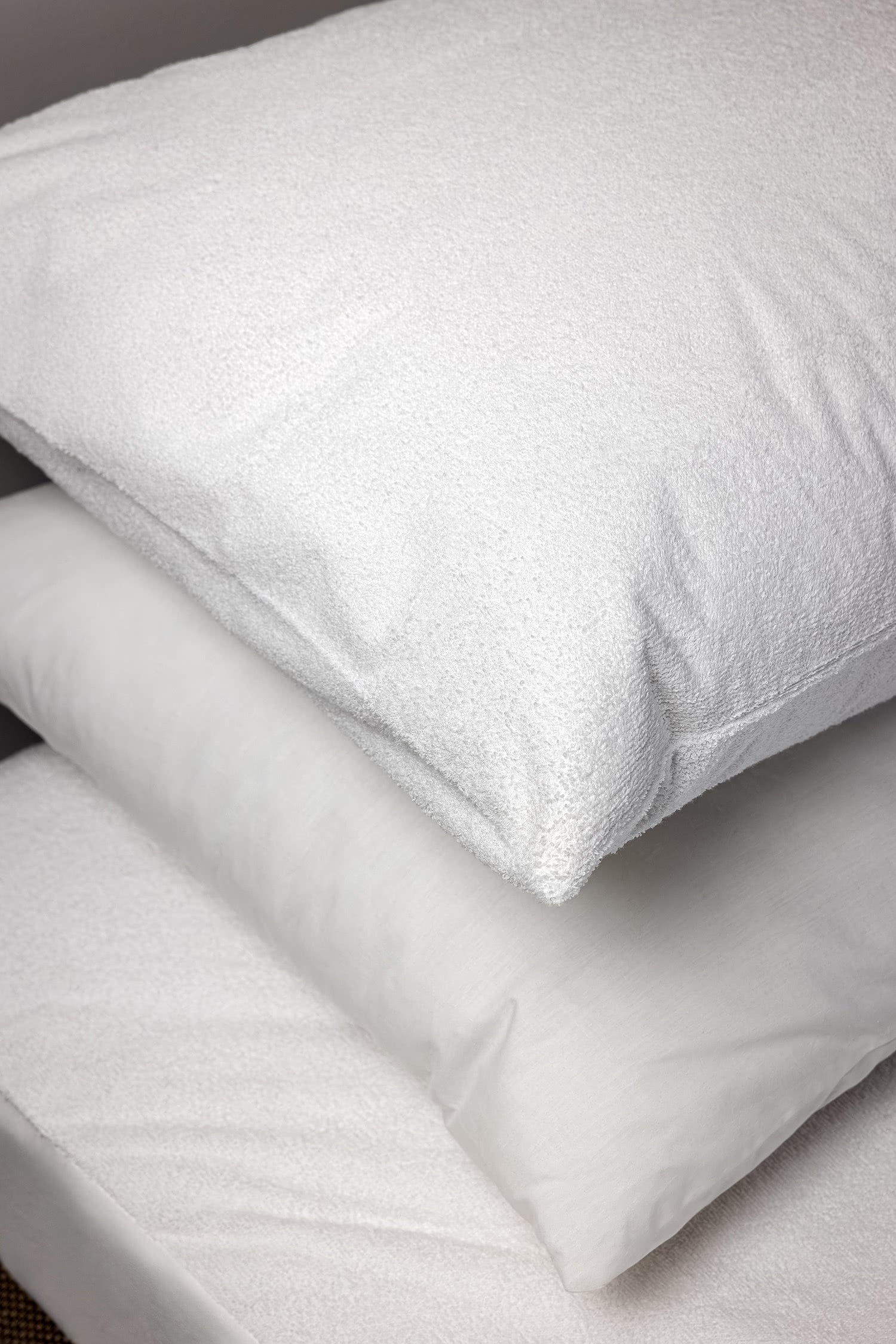 protetor de almofada e almofada de fibra